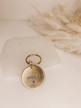 Load image into Gallery viewer, Paw Print Dog Tag, Hand Stamped Metal Pet ID Tag